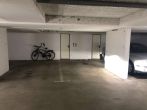 Tiefgaragenstellplatz auf der Leineinsel zu vermieten - Zufahrt mit elektrischem Rolltor - Tiefgarage